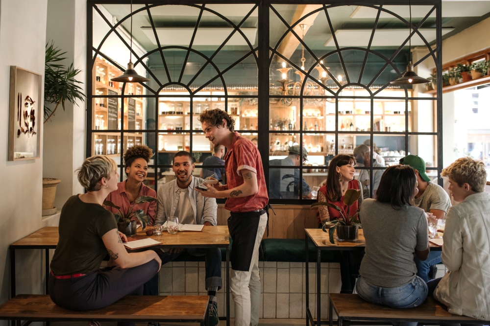 Sequim Restaurants, photo of a busy cafe with diners and servers chatting 